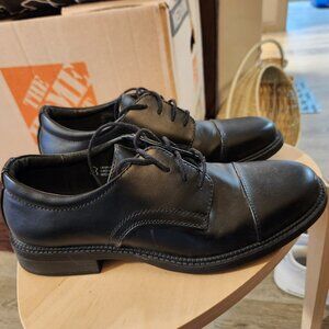 Black derby dress shoes